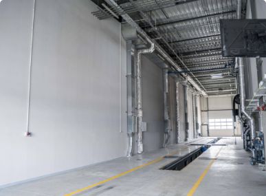 Vehicle inspection station space in Hegelmann Hub